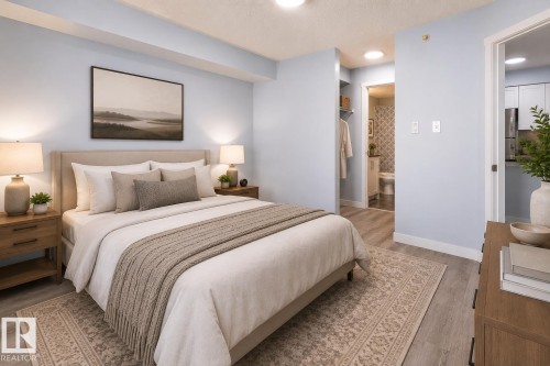 Bedroom featuring wood-finish flooring, a neutral-toned upholstered headboard, and dual built-in overhead lighting fixtures - 403 25 Element Dr, St. Albert, AB - Indoor Photo Showing Bedroom