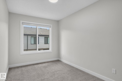 Neutral gray wall paint and clean white trim - 33 11910 35 Avenue, Edmonton, AB 