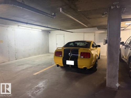 Dedicated parking space with concrete flooring - 114 1080 Mcconachie Boulevard, Edmonton, AB 