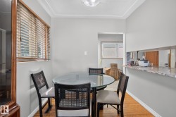 Breakfast bar with a granite-style countertop and an open pass-through - 