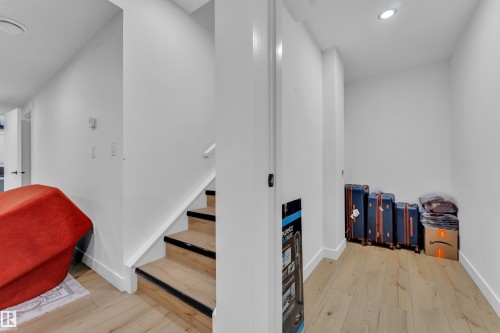 Hardwood flooring throughout entry and staircase - 16816 49 Street, Edmonton, AB 