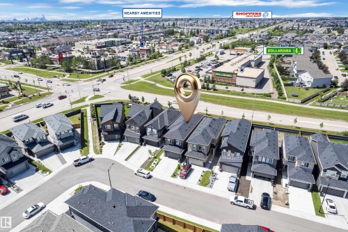 Aerial perspective showcasing a residential development with modern homes - 16816 49 Street, Edmonton, AB 