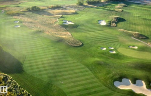 Manicured fairways with striped lawns and multiple sand bunkers - 25 Whitetail Green, Mundare, AB 