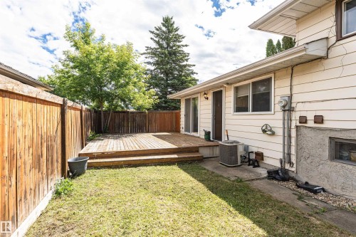 Expansive wooden deck with multi-level steps - 11512 24 Avenue, Edmonton, AB 