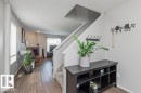 Interior entry with wood-finish flooring extending into living space - 1816 36 Avenue, Edmonton, AB 