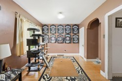 Light wood-finish flooring extending throughout the space - 