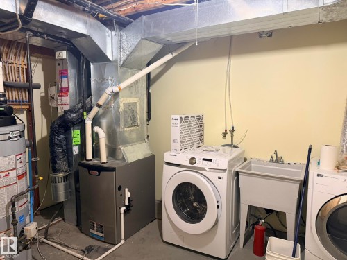 727 Balfour Close Nw, Edmonton, AB - Indoor Photo Showing Laundry Room