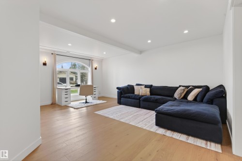 Bright living space featuring light wood-finish flooring - 711 Beach Avenue, Cold Lake, AB - Indoor Photo Showing Living Room