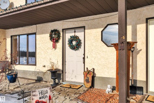 Entrance to property with stucco siding - A49375 Rr 243, Rural Leduc County, AB 