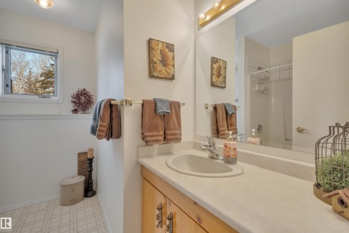 Full bathroom featuring vanity, light flooring, and a shower - A49375 Rr 243, Rural Leduc County, AB 