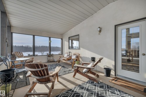 Sunroom featuring vaulted ceiling and wooden ceiling - A49375 Rr 243, Rural Leduc County, AB 