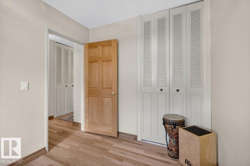 Wood-finish flooring throughout - 10736 48 Street, Edmonton, AB 