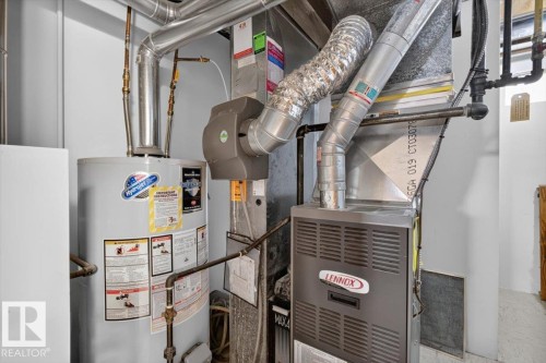 Lennox furnace and water heater with associated ductwork and piping - 10736 48 Street, Edmonton, AB 
