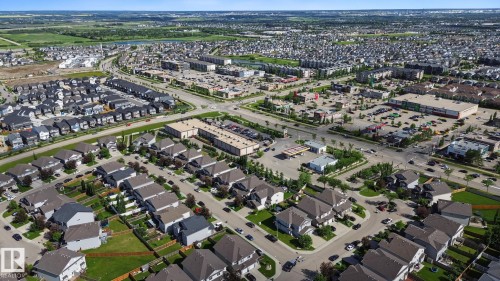 Aerial rendering of a residential development featuring single-family homes and townhomes - 5205 168 Avenue, Edmonton, AB 