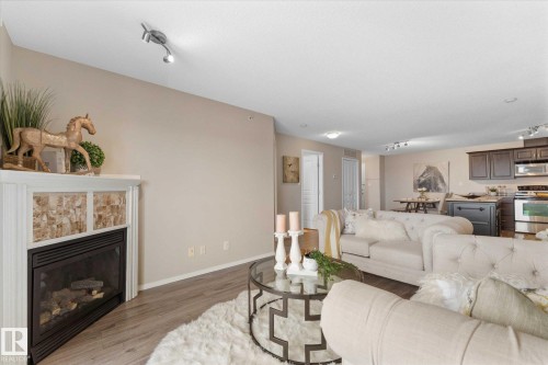 409 16035 132 Street, Edmonton, AB - Indoor Photo Showing Living Room With Fireplace