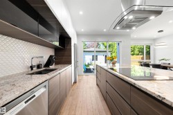 Kitchen features 2 dishwashers. - 