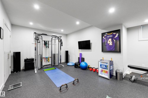 The gym can be converted back to a bedroom OR a nanny suite as it is roughed in for a kitchen. - 7814 142 Street, Edmonton, AB 