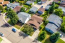 Aerial perspective showcasing a residential neighborhood with diverse roofing styles - 3 Glenforest Crescent, Stony Plain, AB 