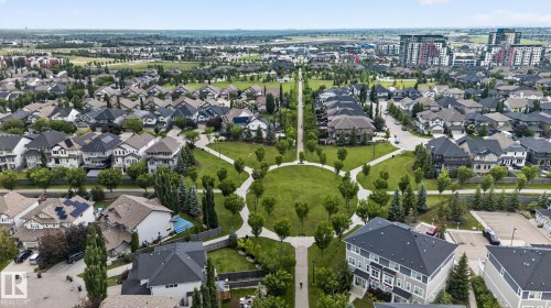 Aerial perspective showcasing a residential community with varied architectural styles - 57 3710 Allan Drive, Edmonton, AB 