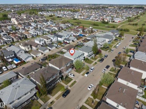 Aerial perspective of a residential neighborhood featuring detached and semi-detached homes - 3032 31 Avenue, Edmonton, AB - Outdoor With View