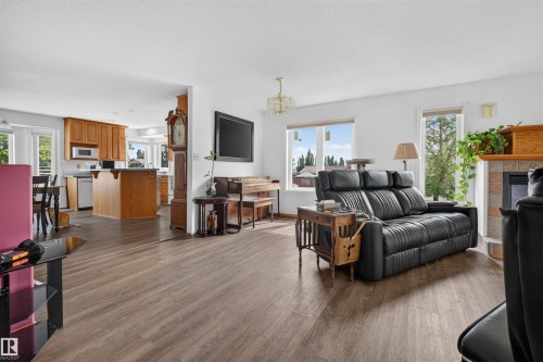 6000 54 Avenue, Camrose, AB - Indoor Photo Showing Living Room With Fireplace
