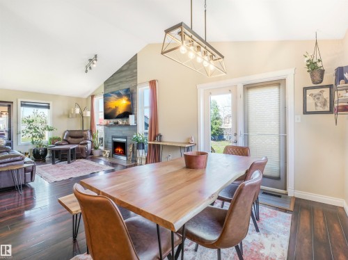 4832 157 Avenue, Edmonton, AB - Indoor Photo Showing Dining Room With Fireplace