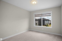 Neutral-toned carpeting paired with light wall paint - 