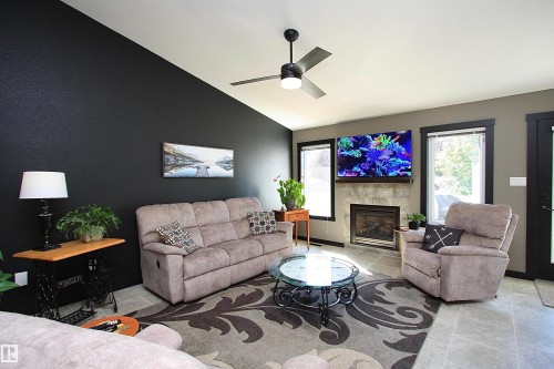 310B Edgewood Close, Camrose, AB - Indoor Photo Showing Living Room With Fireplace