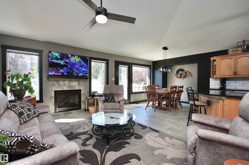 310B Edgewood Close, Camrose, AB - Indoor Photo Showing Living Room With Fireplace