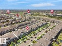 Aerial perspective of a developed residential area featuring multiple housing types - 1419 27 Av, Edmonton, AB 