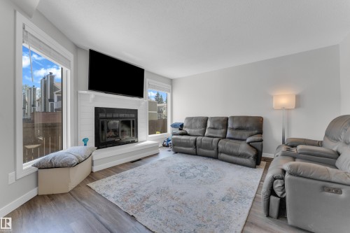 45 1820 56 Street, Edmonton, AB - Indoor Photo Showing Living Room With Fireplace