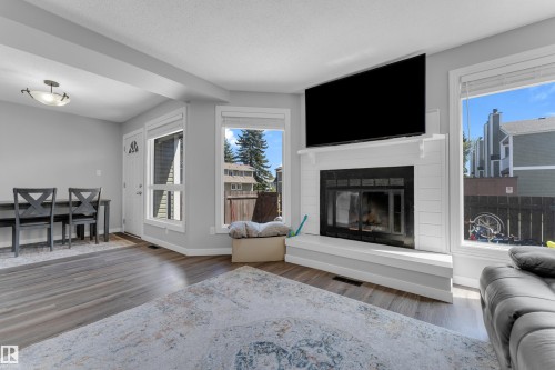 45 1820 56 Street, Edmonton, AB - Indoor Photo Showing Living Room With Fireplace
