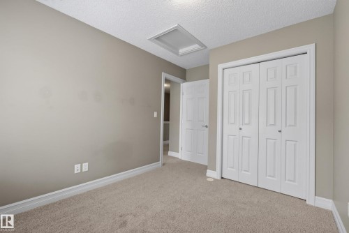 Neutral paint palette and carpeted flooring - 53 3625 144 Avenue, Edmonton, AB 