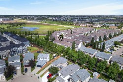 Expansive aerial perspective showcasing a residential community with varied housing styles - 