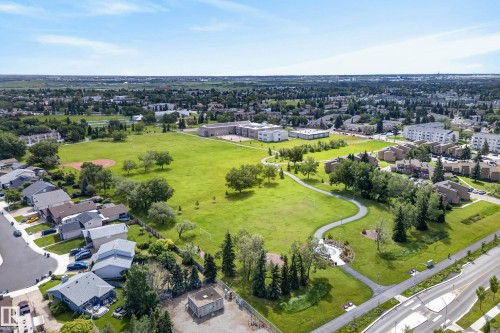 Aerial perspective showcasing a residential area with varied housing styles - 53 3625 144 Avenue, Edmonton, AB 