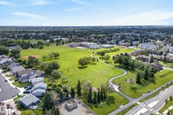Aerial perspective showcasing a residential area with varied housing styles - 