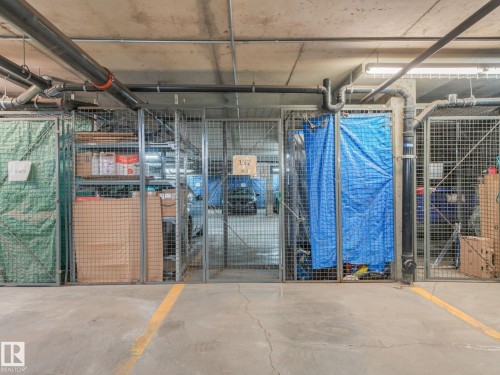 Dedicated storage units within a concrete-floored parking garage - 150 4827 104A Street, Edmonton, AB 