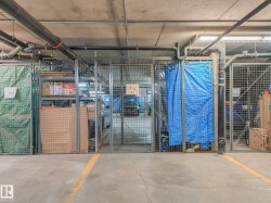 Dedicated storage units within a concrete-floored parking garage - 