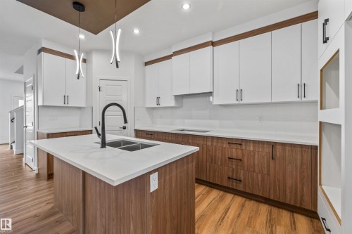 62 Juniper Wynd, Fort Saskatchewan, AB - Indoor Photo Showing Kitchen With Double Sink With Upgraded Kitchen