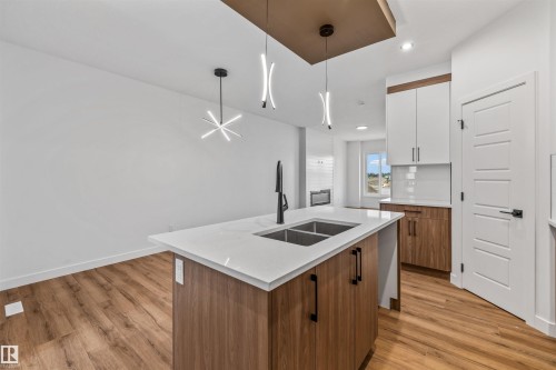 62 Juniper Wynd, Fort Saskatchewan, AB - Indoor Photo Showing Kitchen With Double Sink With Upgraded Kitchen