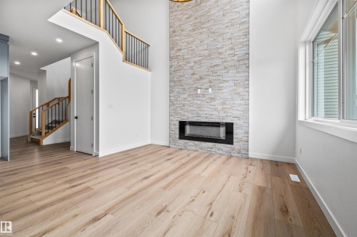 6 Enns Court, Fort Saskatchewan, AB - Indoor Photo Showing Living Room With Fireplace