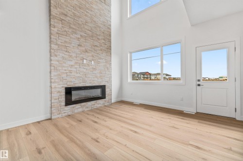 6 Enns Court, Fort Saskatchewan, AB - Indoor Photo Showing Living Room With Fireplace