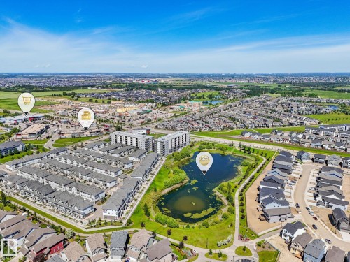 Aerial overview of a residential community featuring a variety of housing types - 55 4470 Prowse Road, Edmonton, AB 