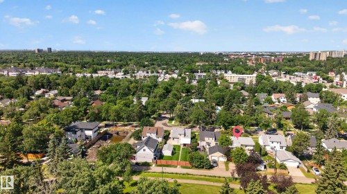 Expansive residential area featuring numerous mature trees and a mix of single-family homes - 11015 122 Street, Edmonton, AB 