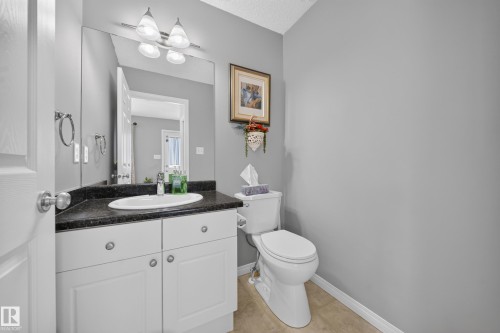 709 83 St Sw, Edmonton, AB - Indoor Photo Showing Bathroom