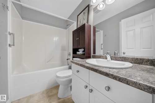 709 83 St Sw, Edmonton, AB - Indoor Photo Showing Bathroom