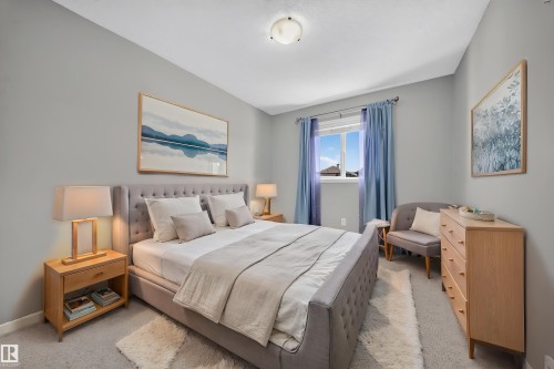 709 83 St Sw, Edmonton, AB - Indoor Photo Showing Bedroom