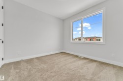 Neutral tone wall finishes complemented by white trim - 