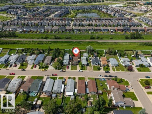 Residential neighborhood featuring a variety of single-family homes, mature trees, and paved streets - 14530 37 Street, Edmonton, AB 