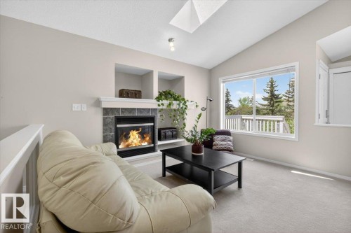7928 10 Avenue, Edmonton, AB - Indoor Photo Showing Living Room With Fireplace